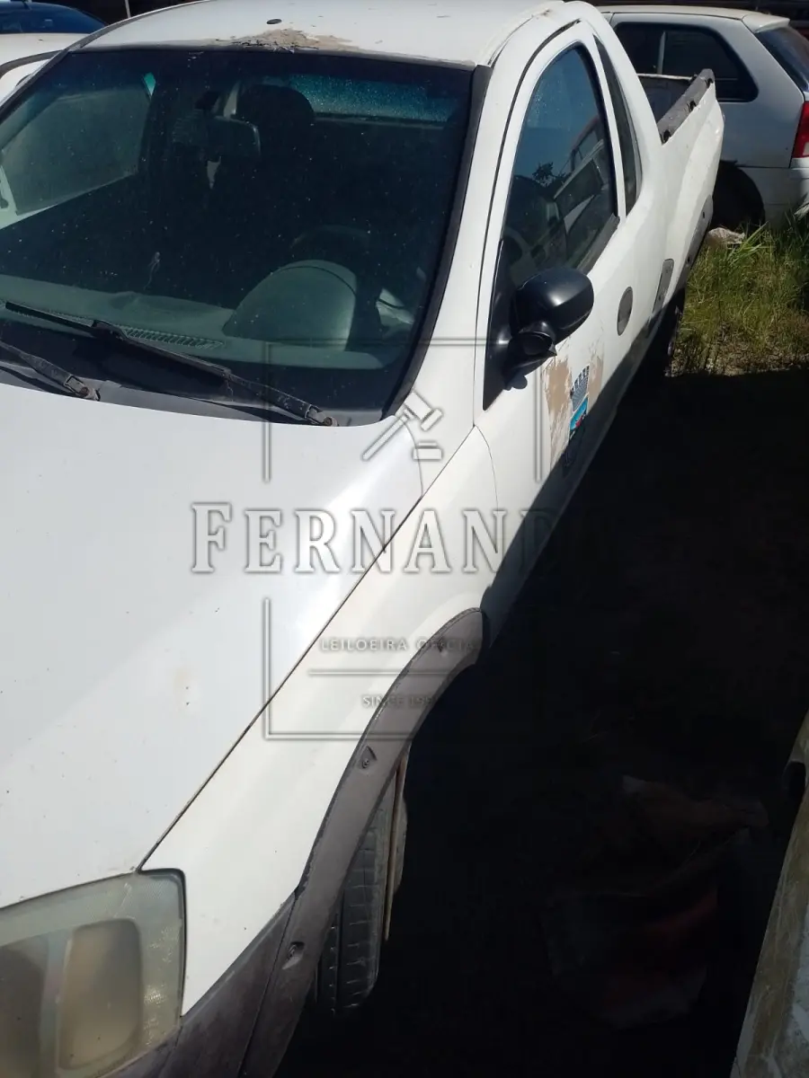 LOTE 013 - Veículo GM/ Montana Conquest, Ano/modelo 2005/2005, Placa IMP8431. Avaliado em R$ 2.600,00.