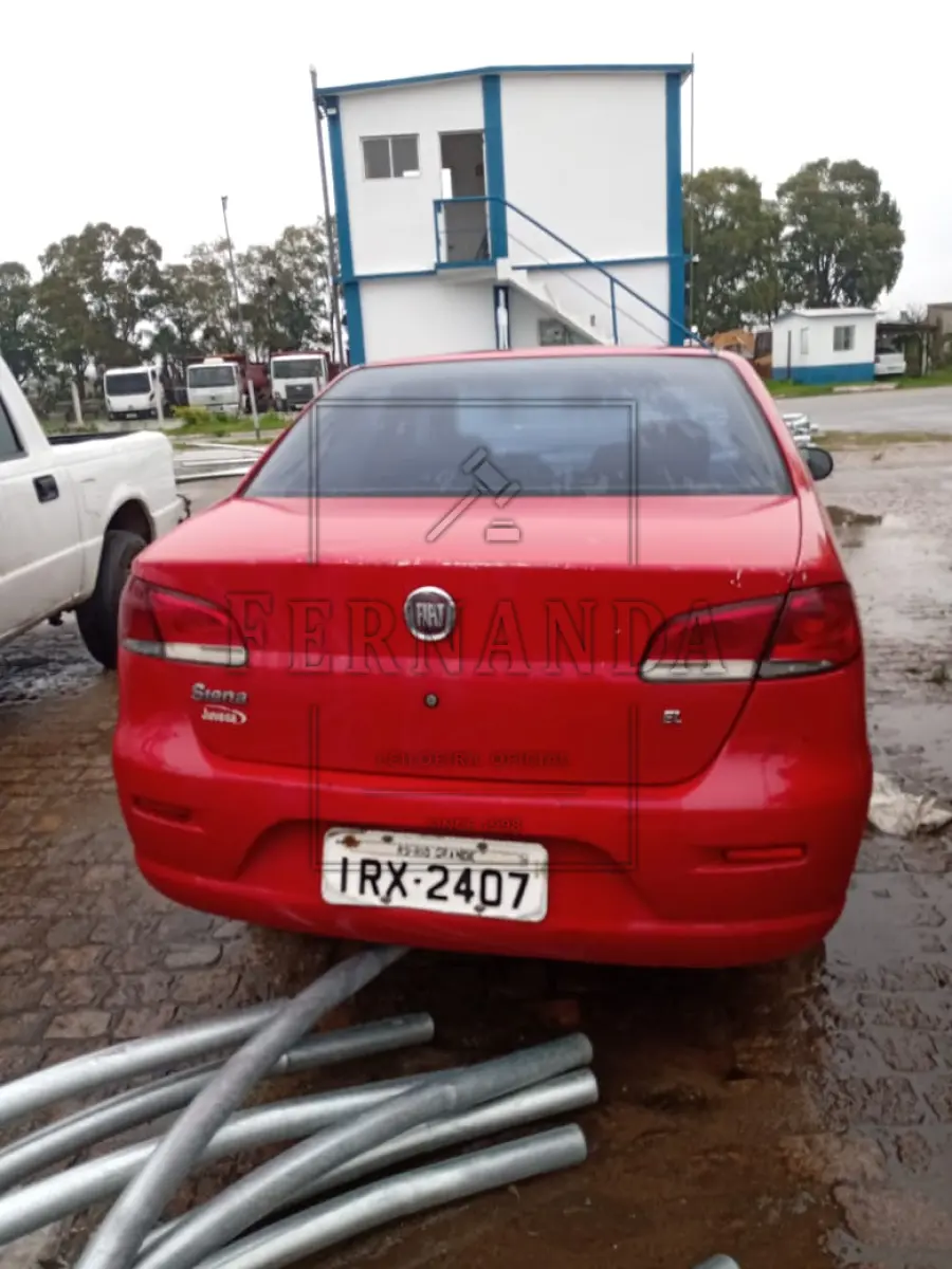 LOTE 058 - Veículo Fiat Siena EL Flex, ano/modelo 2011/2011, placa IRX2407. Avaliado em R$ 3.000,00.