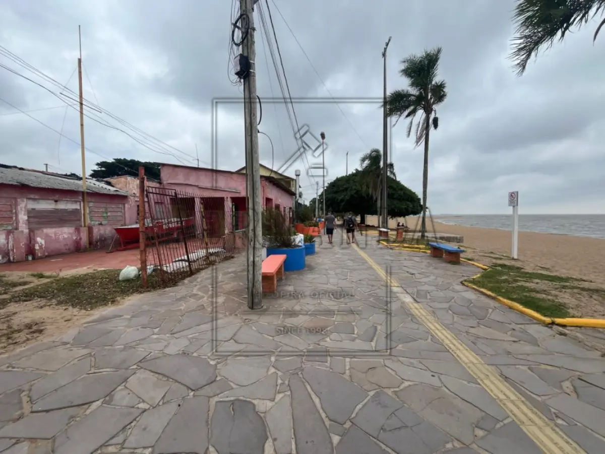 LOTE 011 - Imóvel situado na Rua da Praia – Calçadão, de Arambaré/RS R$ 937.973,61