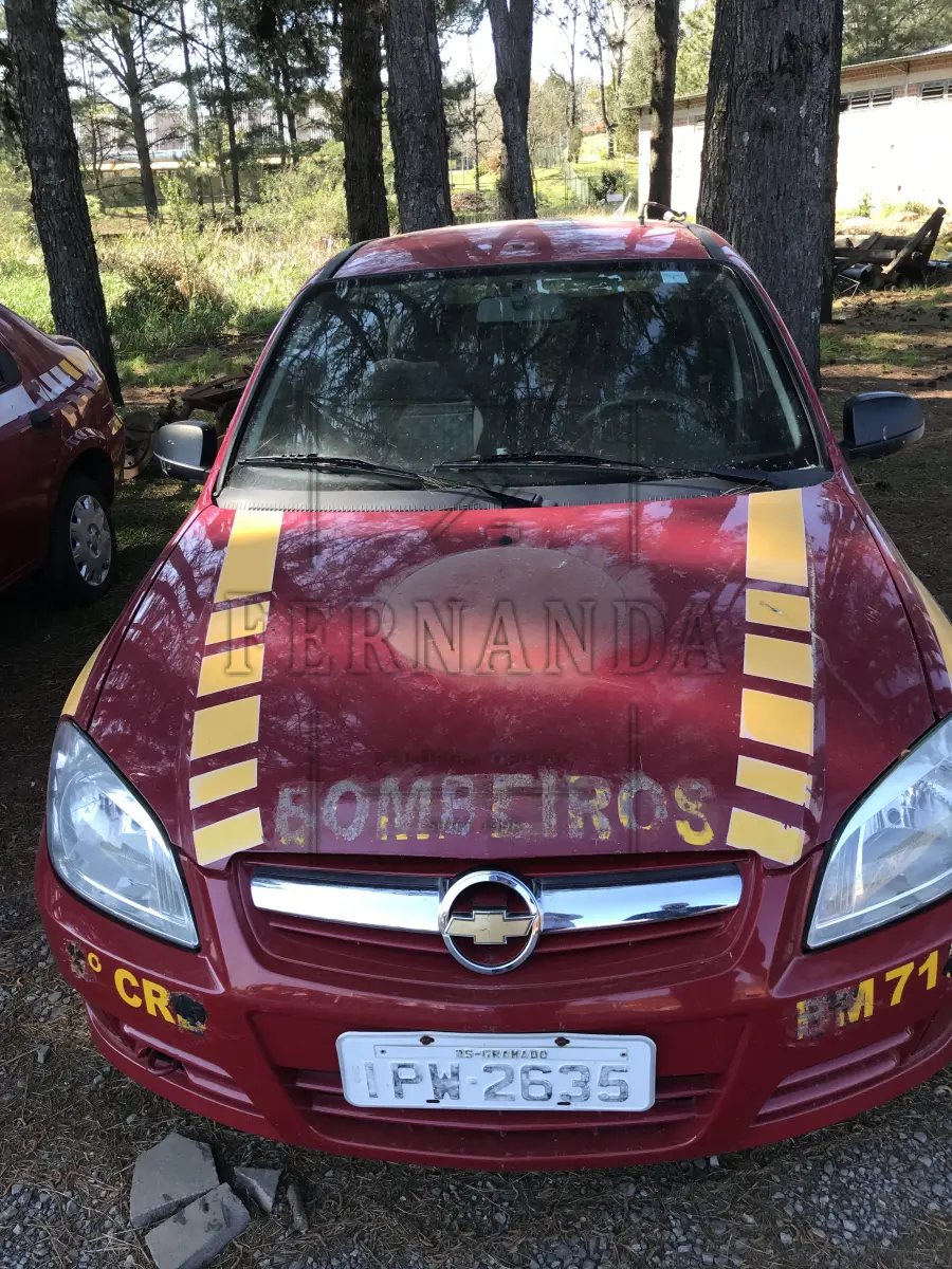LOTE 004 - GM Prisma Joy 5p, cor vermelha, ano 2009, placa IPW 2635.