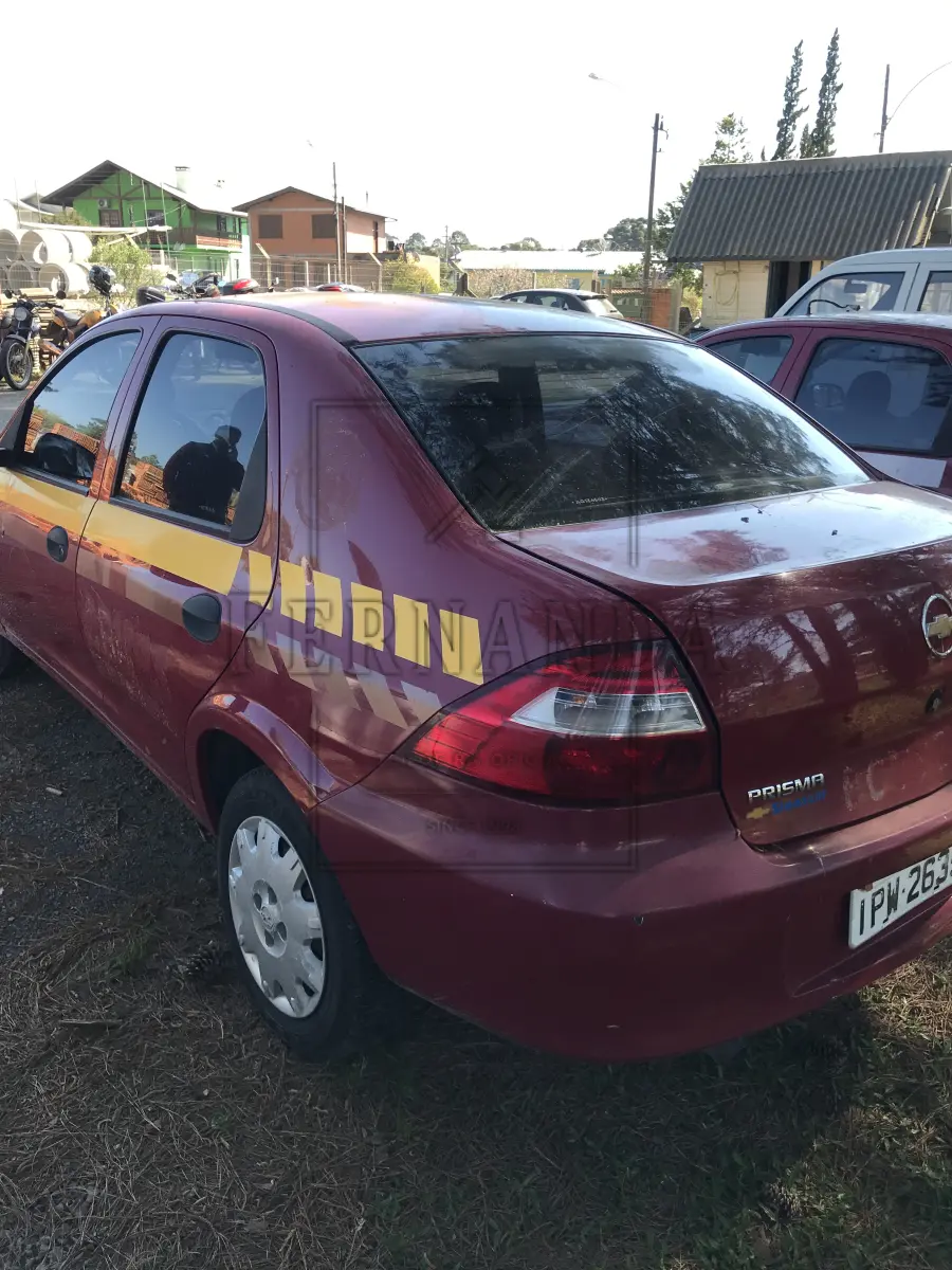 LOTE 004 - GM Prisma Joy 5p, cor vermelha, ano 2009, placa IPW 2635.