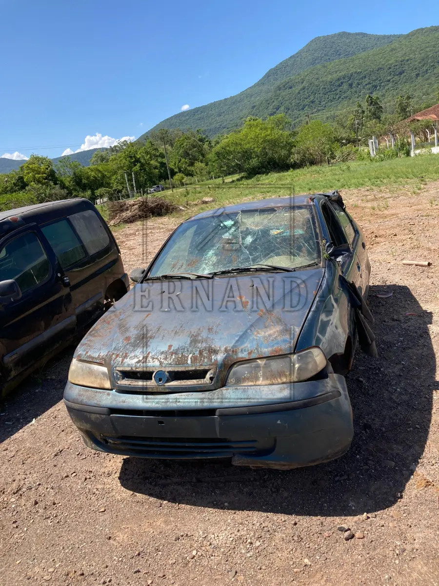 LOTE 024 - I/Fiat, Siena EX , Ano/Modelo 2001/2001, PLACA: IKF0842. Avaliado em R$ 800,00.