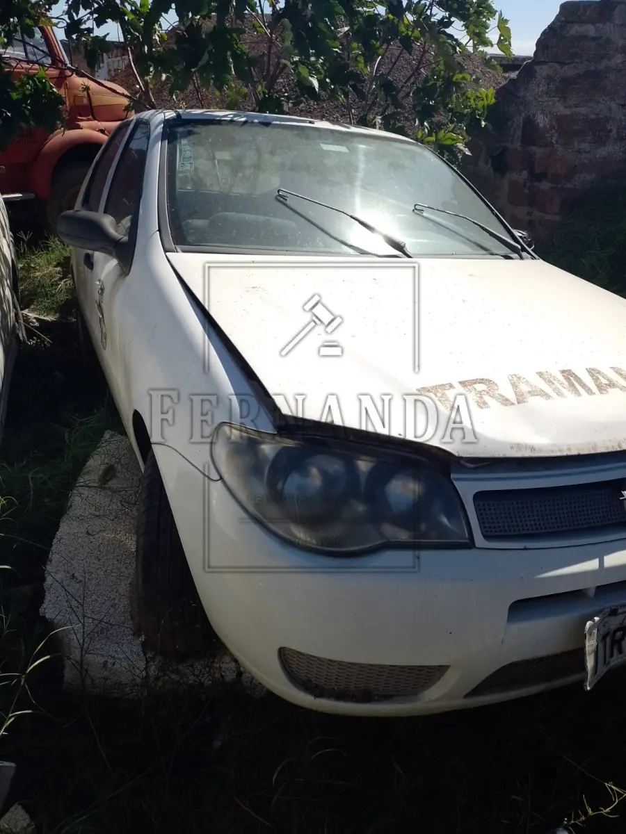 LOTE 004 - Veículo FIAT/ Palio Fire Economy, Ano/modelo 2009/2010, Placa ITR1140. Avaliado em R$ 2.600,00.